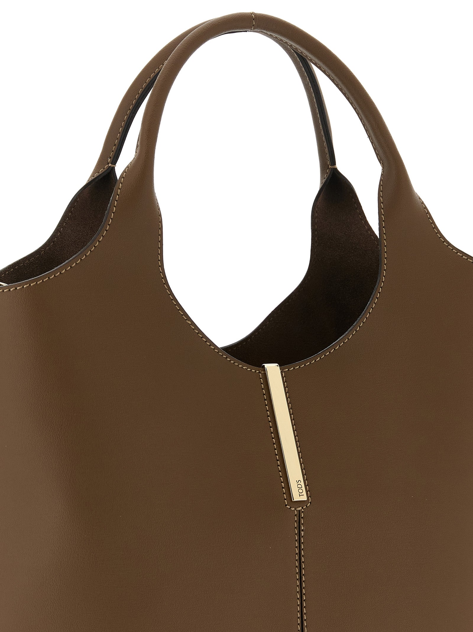 Small Handbag by Tod's for women in bos taurus calf suede leather brown presents a ornamental silhouette, showcasing a secure snap & hook, ample , and versatile shoulder-strap, adjustable-strap & handle for a ornamental finish.