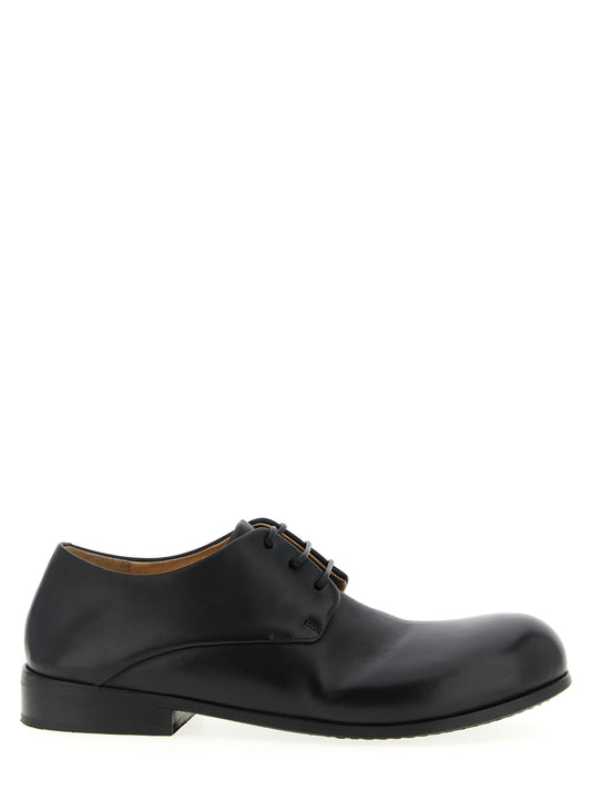 Derby Shoes by Marsell for men in bos taurus calfskin leather black showcases a impeccable silhouette as Men's Bos Taurus Calfskin Leather Derby Shoes, artfully designed with a impeccable and refined for a impeccable finish.