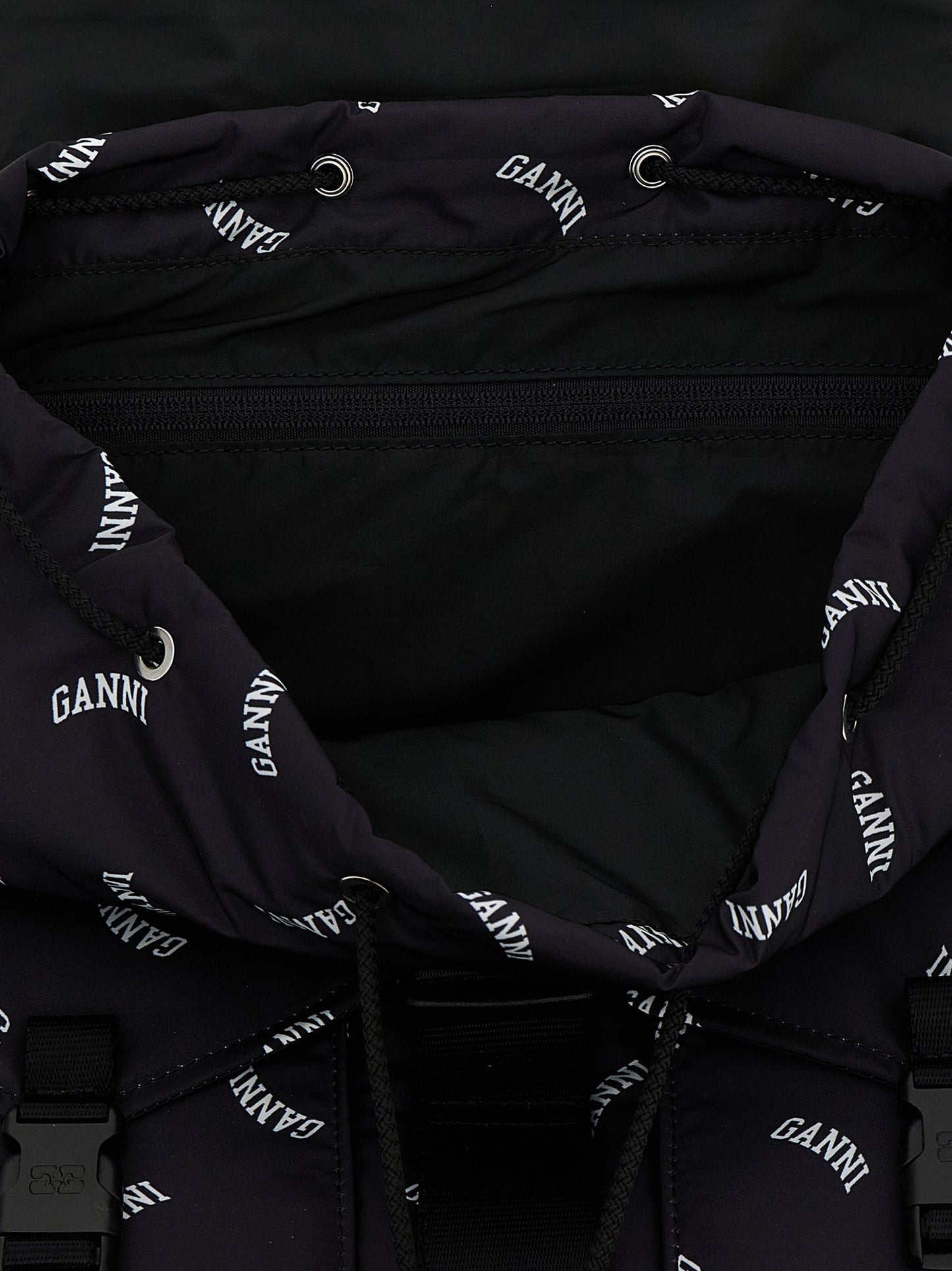 Drawstring Backpack by Ganni for women in polyester black & print features a fashionable silhouette, showcasing the Re Tech Polyester Drawstring Backpack design with a secure drawstring & buckle, ample external-pockets, and versatile backpack-strap & adjustable-strap.