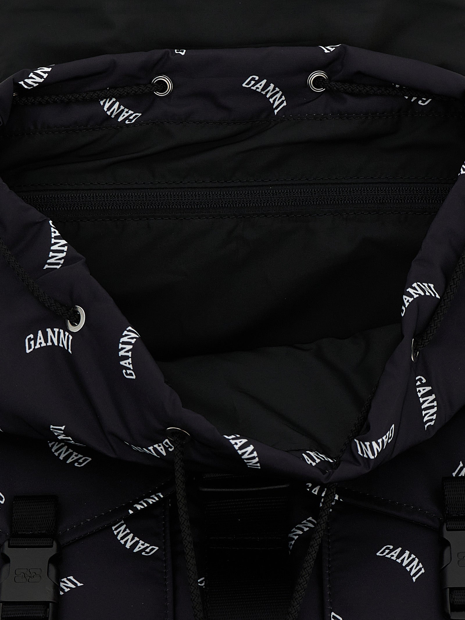 Drawstring Backpack by Ganni for women in polyester black & print features a fashionable silhouette, showcasing the Re Tech Polyester Drawstring Backpack design with a secure drawstring & buckle, ample external-pockets, and versatile backpack-strap & adjustable-strap.