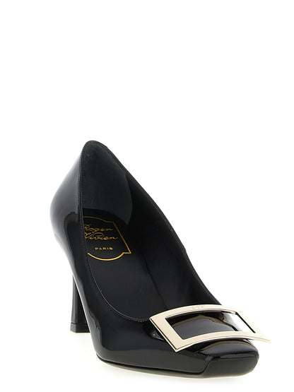 Mid-Heel Pumps Heels by Roger Vivier for women in patent calfskin leather black features an captivating silhouette, showcasing the elegant Grace Women's Patent Calfskin Leather Mid-Heel Pumps Heels design with a mid-heel and a sophisticated .