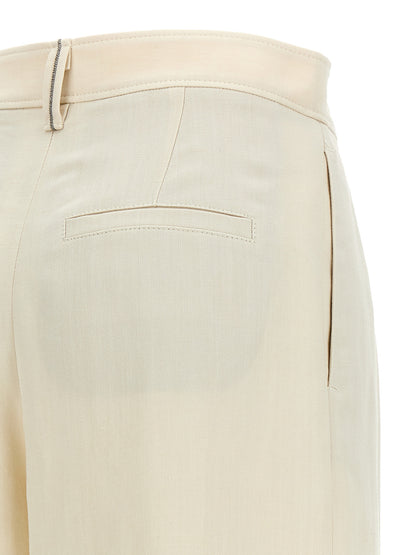 Palazzo Pants by Brunello Cucinelli for women in linen & viscose white features an sartorial wide and long with a cut for a sartorial finish.