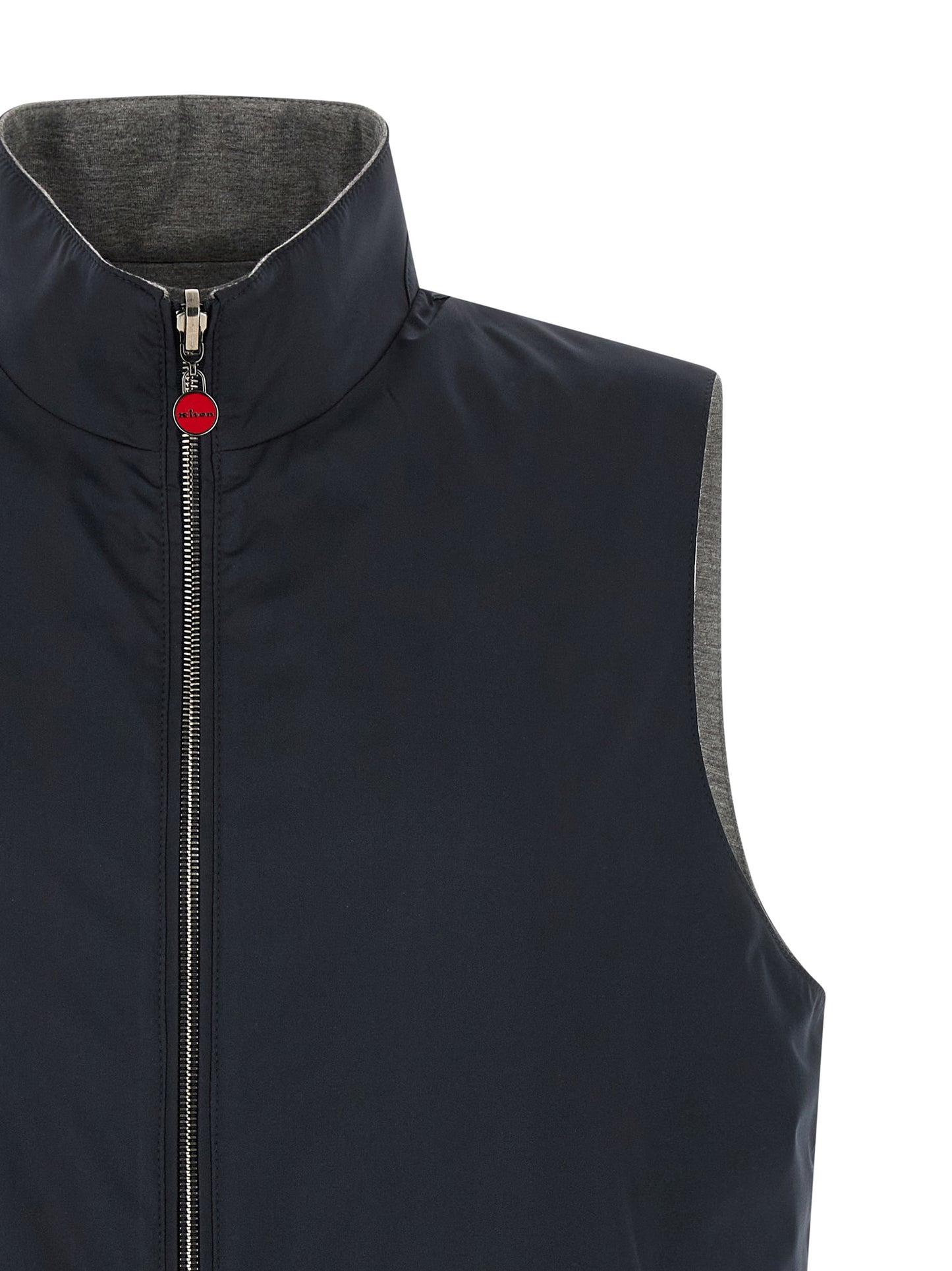 Vest by Kiton for men in stretch cotton & nylon blue showcases a utilitarian silhouette, artfully incorporating pockets and a utilitarian high-neck neckline for a truly utilitarian finish.