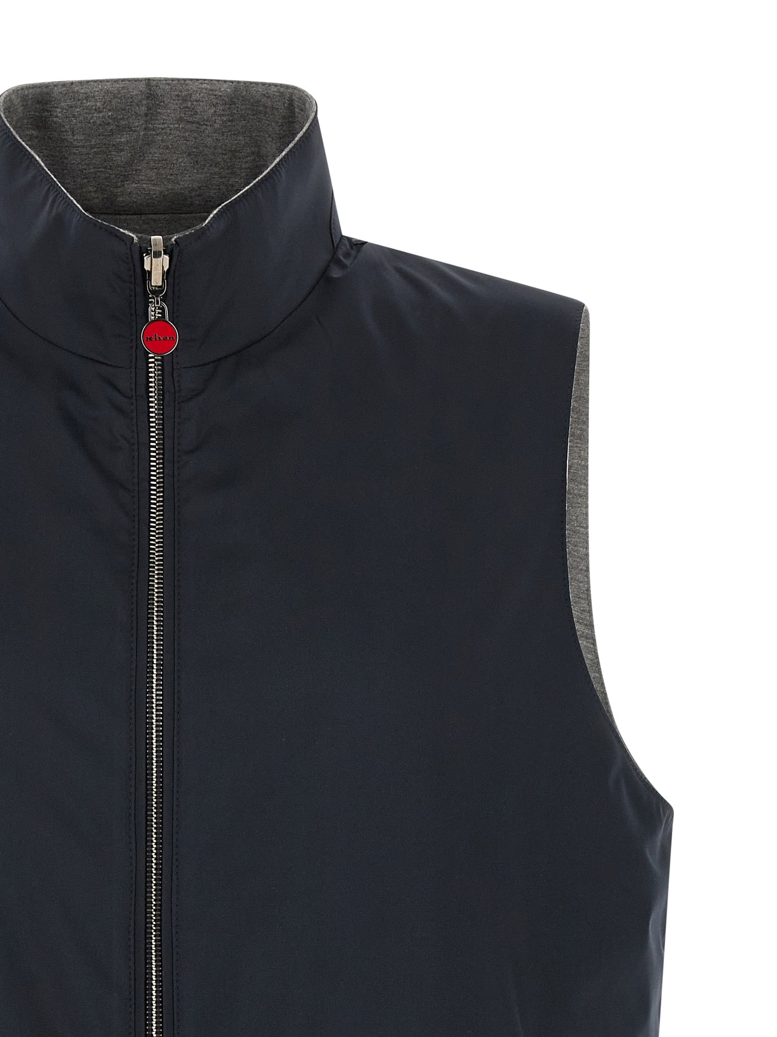 Vest by Kiton for men in stretch cotton & nylon blue showcases a utilitarian silhouette, artfully incorporating pockets and a utilitarian high-neck neckline for a truly utilitarian finish.