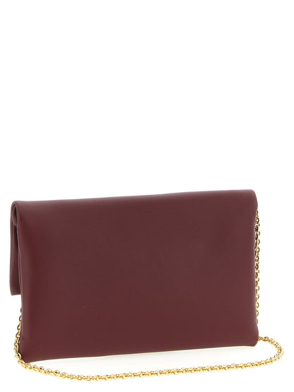 Shoulder Baguette Clutch Handbag by Fendi for women in lamb leather bordeaux & signature showcases a sculptural silhouette, featuring a secure flap & magnetic, ample , and versatile shoulder-strap & wristlet for a sculptural finish.