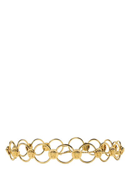 Belt by Versace for women in brass gold features a versatile silhouette, artfully showcasing the versatile design of the Medusa Brass Belt for a sophisticated, premium finish.