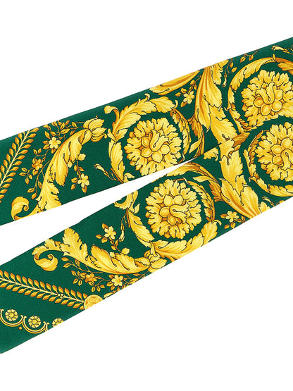 Necktie by Versace for women in silk twill multicolor & print features a sun-drenched silhouette, showcasing the sun-drenched design of this Essence Silk Twill Necktie with a sun-drenched finish.