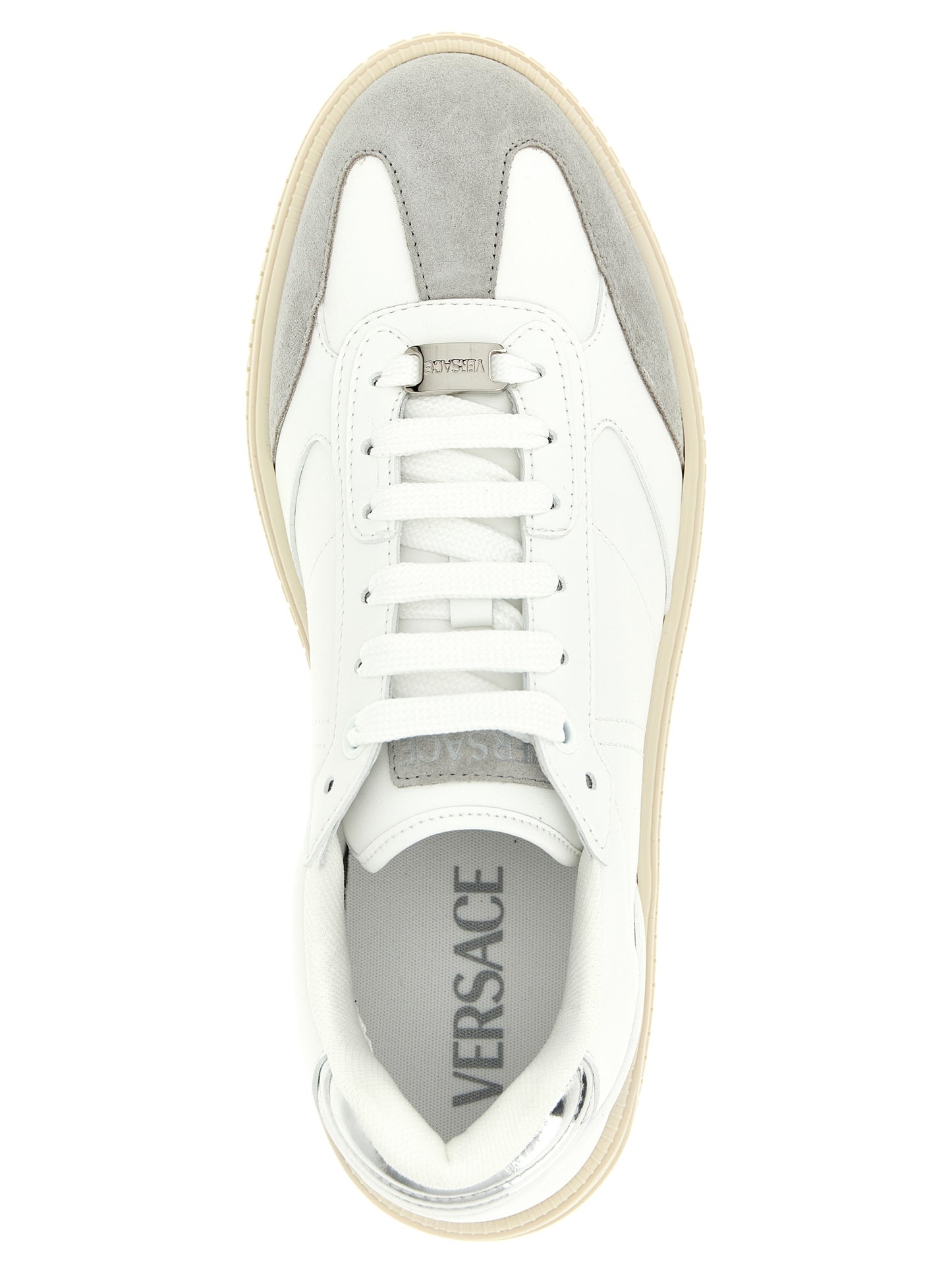 Sneakers by Versace for men in suede calfskin leather white presents a on trend silhouette from the Men's Low Top Suede Calfskin Leather Sneakers collection, showcasing a on trend low-top style for an elevated aesthetic.