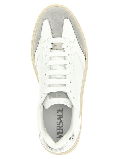 Sneakers by Versace for men in suede calfskin leather white presents a on trend silhouette from the Men's Low Top Suede Calfskin Leather Sneakers collection, showcasing a on trend low-top style for an elevated aesthetic.
