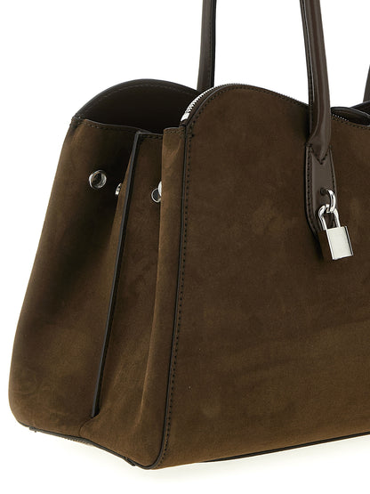Shoulder Bag by Stella McCartney for women in faux polyester fur brown features a effortless chic silhouette with a secure snap & zipper, ample , and versatile shoulder-strap & handle for a effortless chic finish.