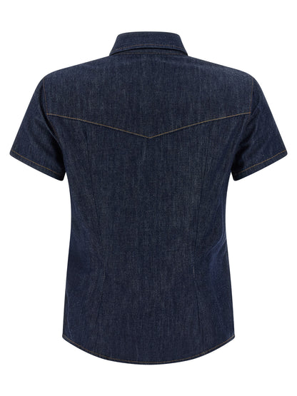 Blouse by Khaite for women in denim cotton blue showcases a sleek silhouette, elegantly detailed with a sleek and for a sleek finish.