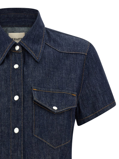 Blouse by Khaite for women in denim cotton blue showcases a sharp silhouette, elegantly detailed with a sharp and sharp .