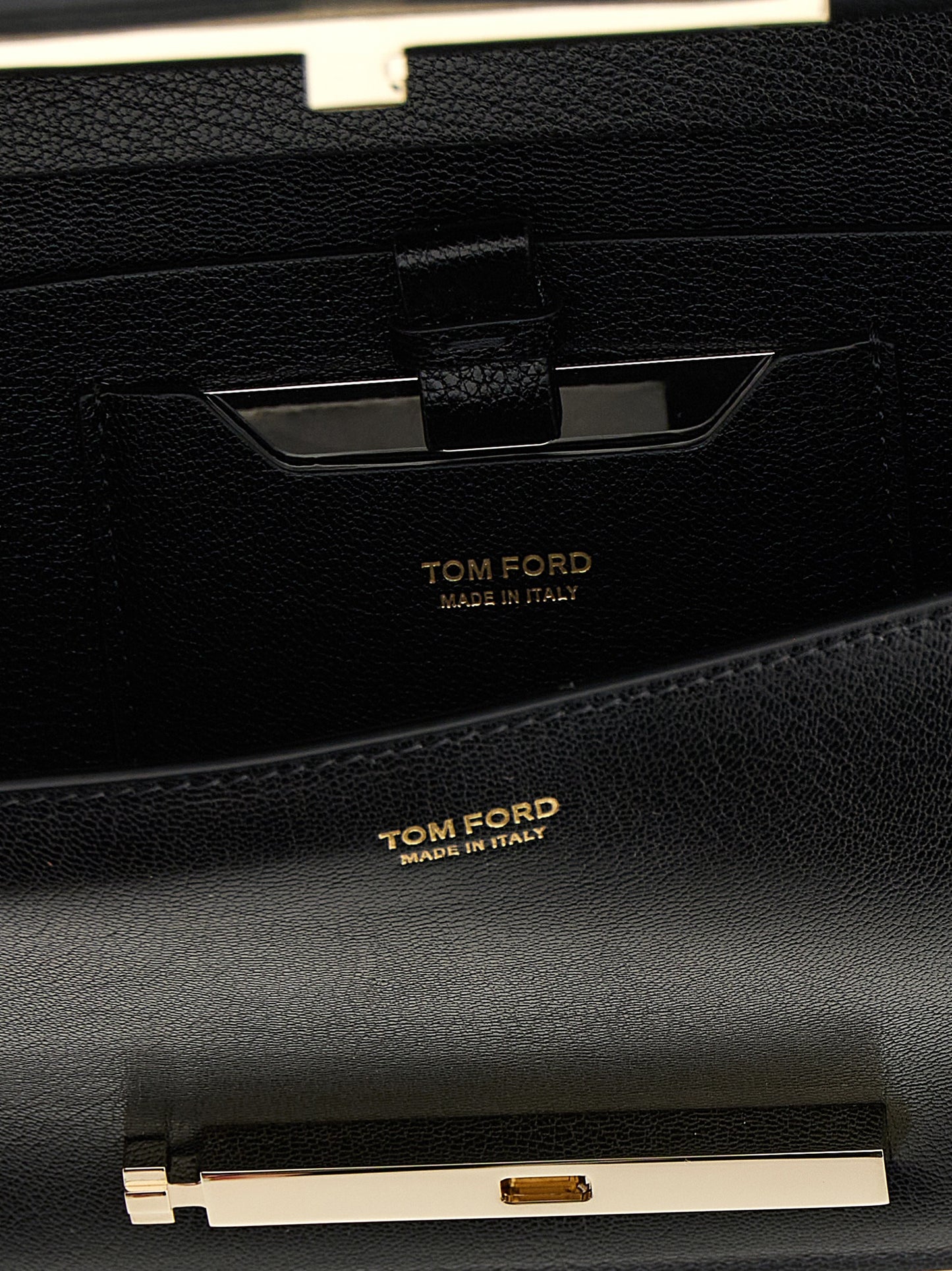 Shoulder Bag by Tom Ford for women in viscose goat leather & fur black features a effortless sophistication silhouette, secured by a buckle with ample and versatile shoulder-strap & adjustable-strap for a effortless sophistication finish.