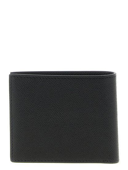 Wallet by Tom Ford for men in bos taurus suede calf leather black & gold presents a streamlined silhouette, showcasing the sophisticated design of the Bos Taurus Suede Calf Leather Wallet collection with functional bifold.