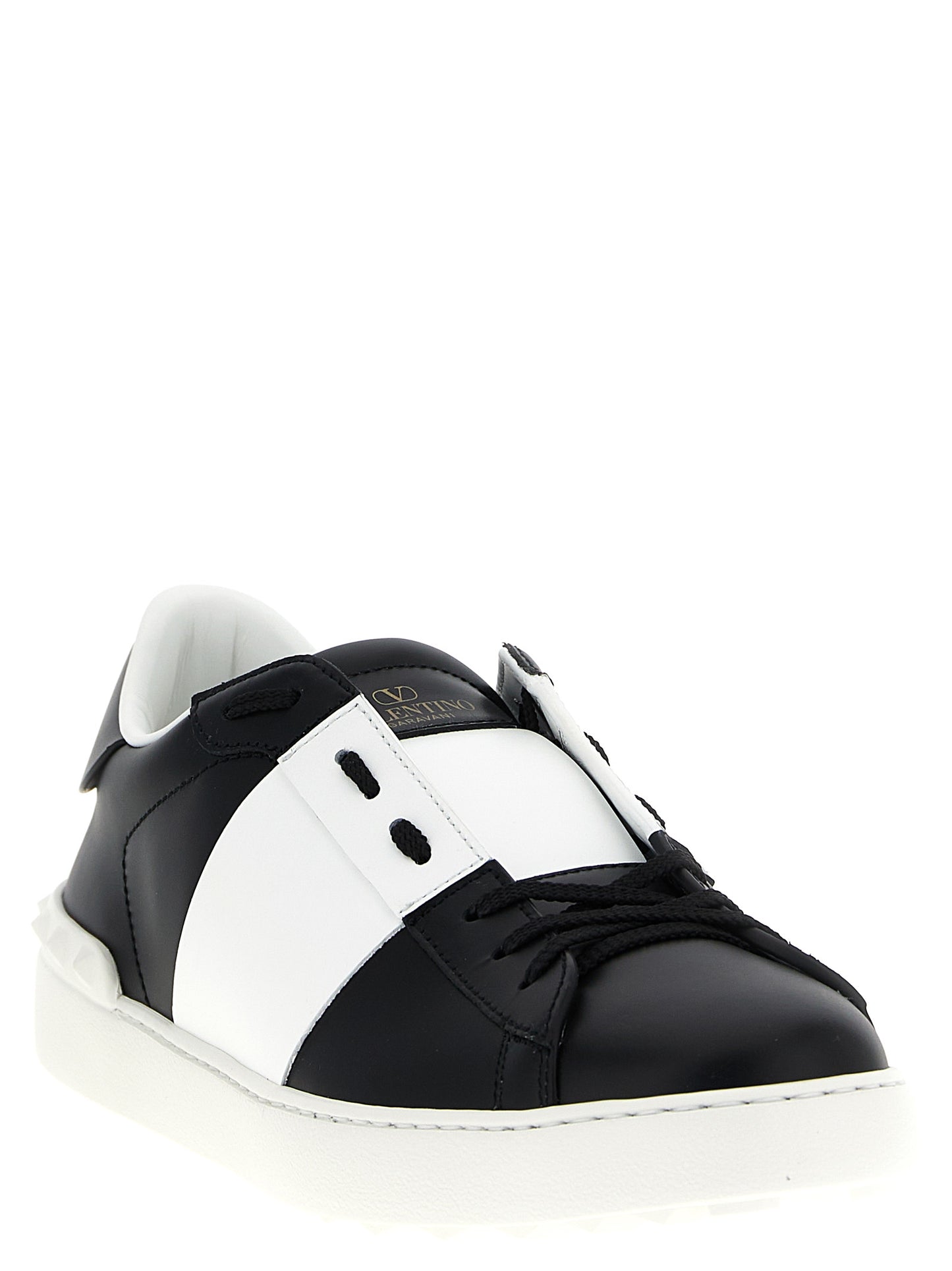 Sneakers by Valentino Garavani for men in calfskin leather bicolour, black, white & signature presents a on trend silhouette from the Men's Fashion Calfskin Leather Sneakers collection, showcasing a on trend fashion style for an elevated aesthetic.