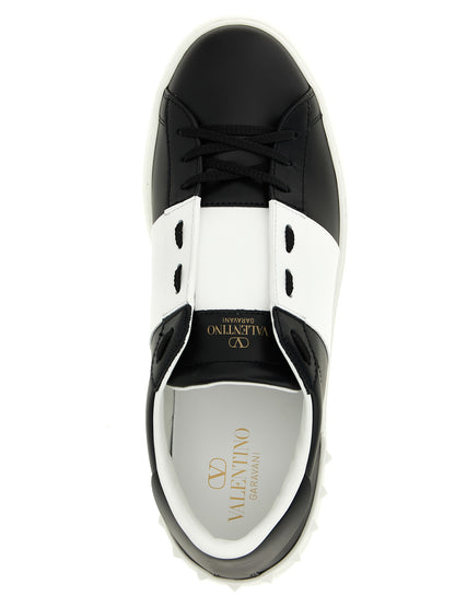 Sneakers by Valentino Garavani for men in calfskin leather bicolour, black, white & signature presents a sumptuous silhouette, artfully capturing the essence of the Men's Fashion Calfskin Leather Sneakers with its sumptuous fashion style design.