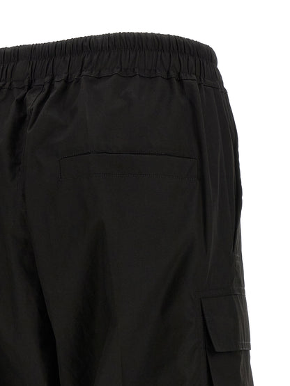 Cargo Pants by Rick Owens for women in cotton black features an urban chic wide with a and long, creating a urban chic aesthetic for "Moon Behind the Hill".