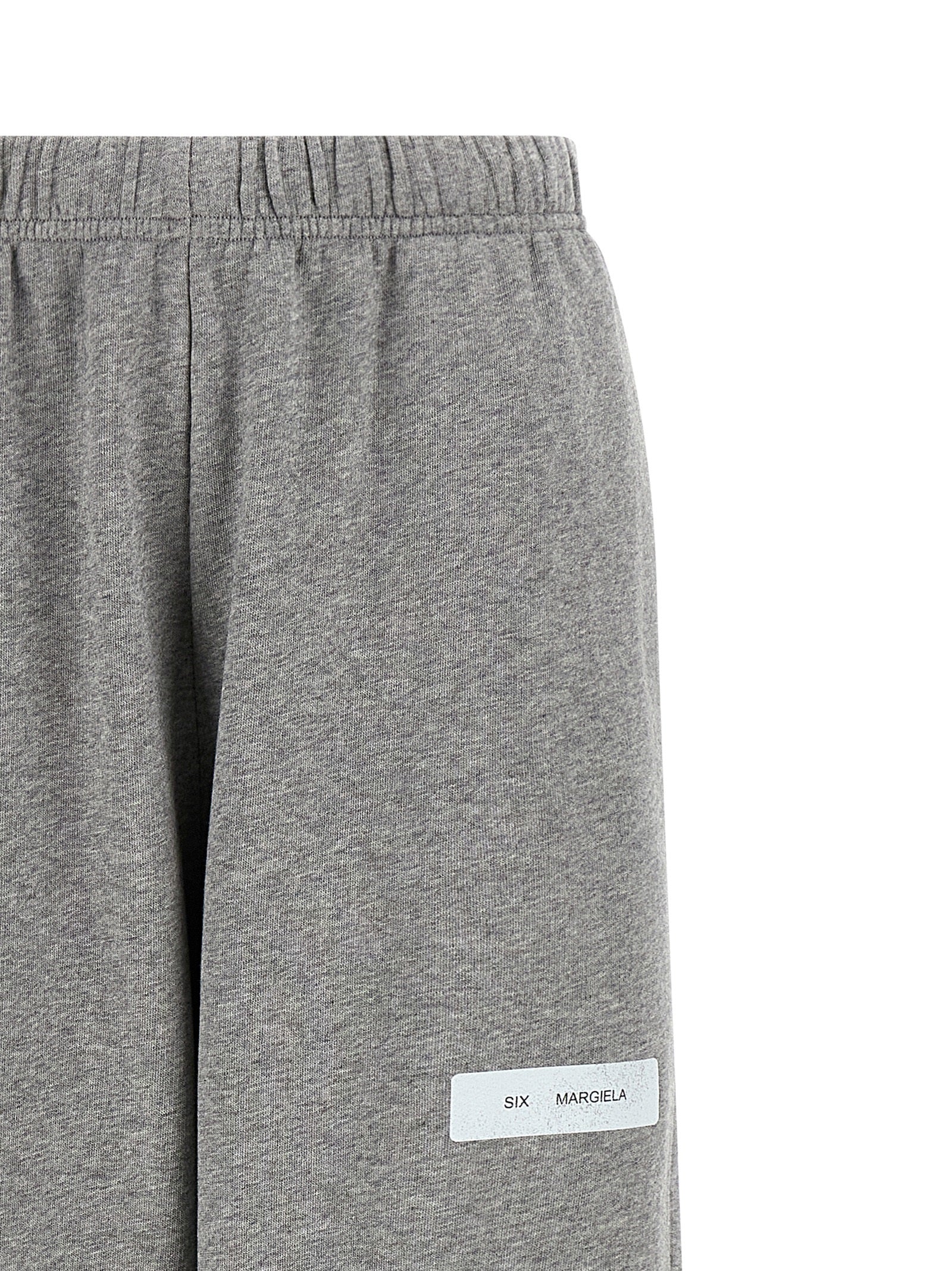 Joggers by MM6 Maison Margiela for women in cotton gray & print presents a refined pantology silhouette, artfully defined by a refined pantology , long, and a sophisticated .