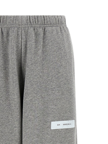 Joggers by MM6 Maison Margiela for women in cotton gray & print presents a refined pantology silhouette, artfully defined by a refined pantology , long, and a sophisticated .