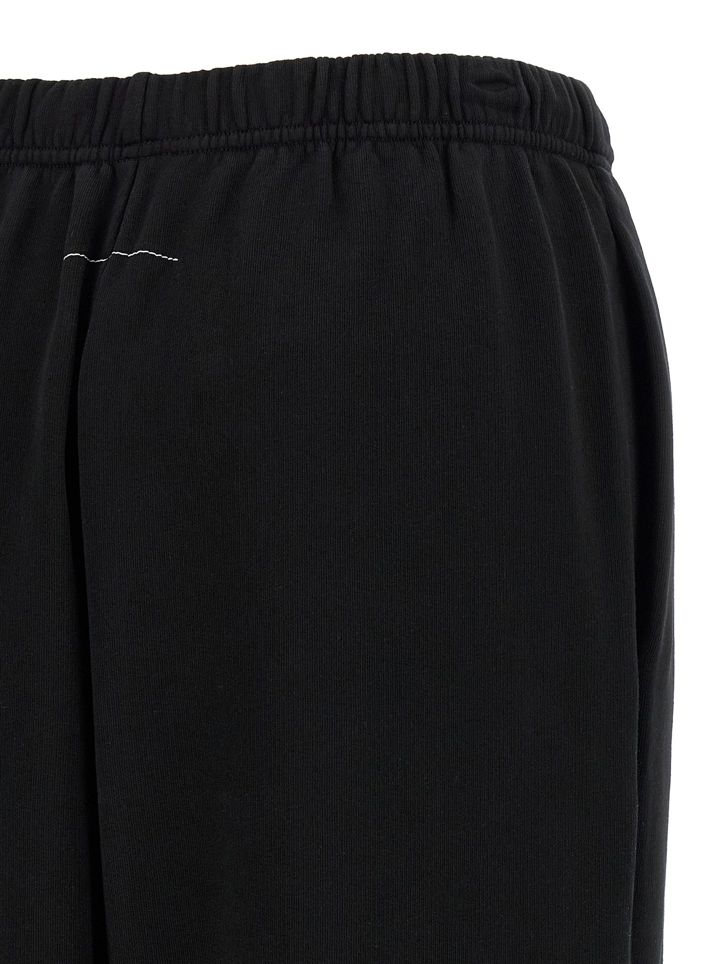 Joggers by MM6 Maison Margiela for women in cotton black & print presents a refined pantology silhouette, artfully defined by a refined pantology , long, and a sophisticated .