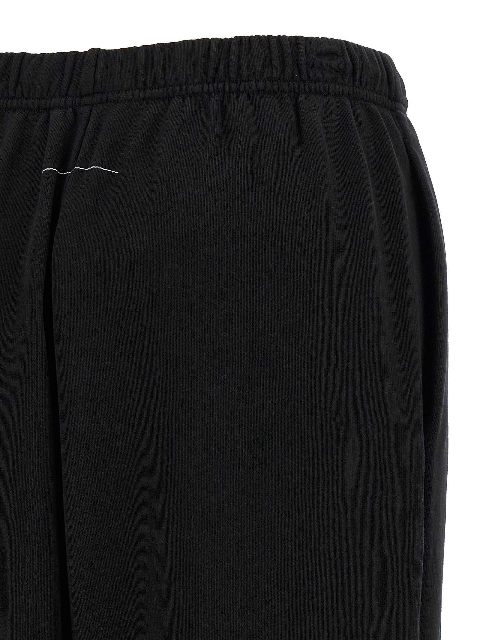 Joggers by MM6 Maison Margiela for women in cotton black & print presents a refined pantology silhouette, artfully defined by a refined pantology , long, and a sophisticated .