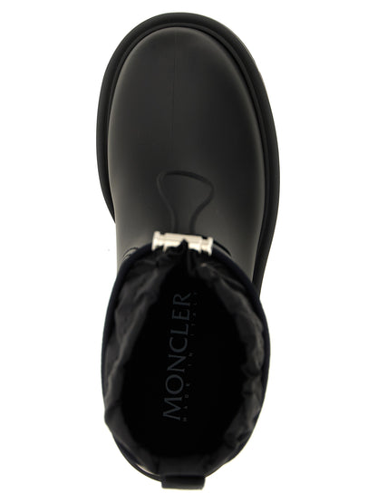 Ankle Rain Boots by Moncler for women in nylon eva & pvc black showcases a ergonomic silhouette from the The Blend Women's Nylon EVA & PVC Ankle Rain Boots collection, featuring a ergonomic and a ergonomic .
