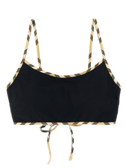 Swimwear Top by Burberry for women in stretch nylon black showcases a contemporary silhouette, artfully capturing the essence of the contemporary Women's Stretch Nylon Swimwear Top design for a sophisticated look.