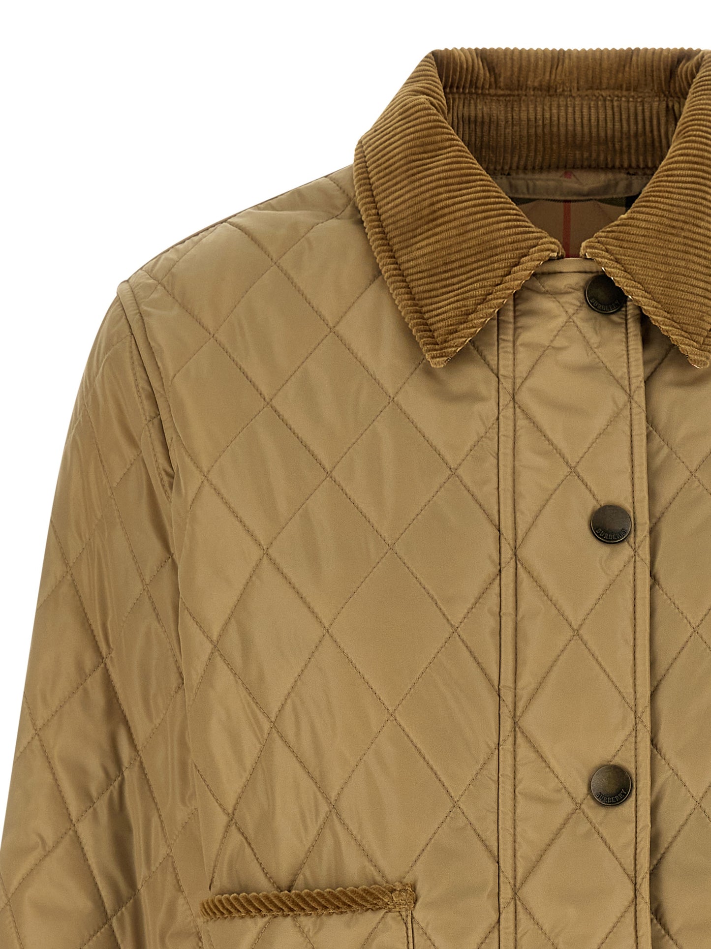 Jacket by Burberry for women in nylon cotton corduroy twill beige showcases a enveloping silhouette, artfully detailed with a enveloping shirt-collar neckline and premium for a truly enveloping finish.