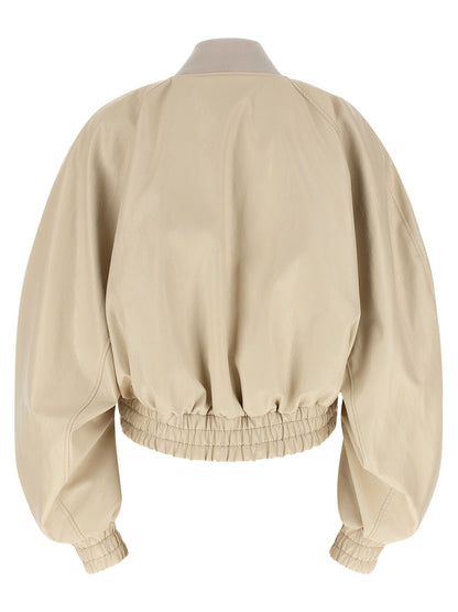 Bomber Jacket by The Andamane for women in polyester polyamide polyurethane leather & cotton beige showcases a bohemian silhouette, artfully detailed with a bohemian high-neck neckline and signature pockets for a truly bohemian finish.