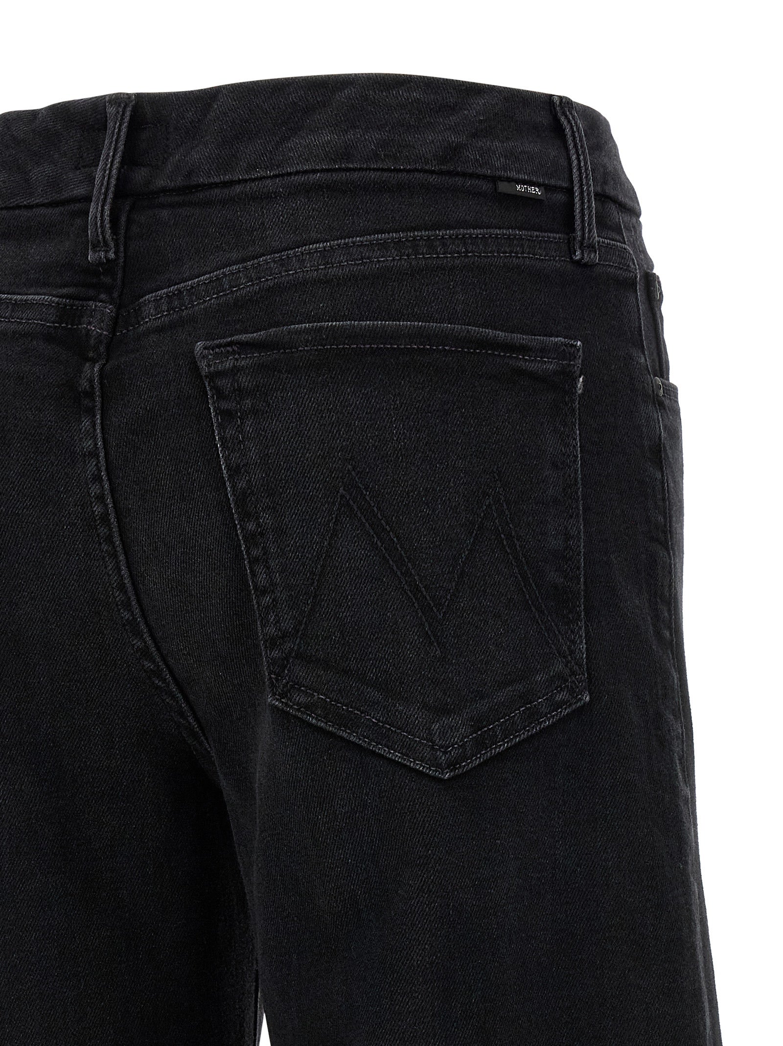 Jeans by Mother Denim for women in stretch denim cotton polyester black features an sartorial flared & wide and long with a cut for a sartorial finish.