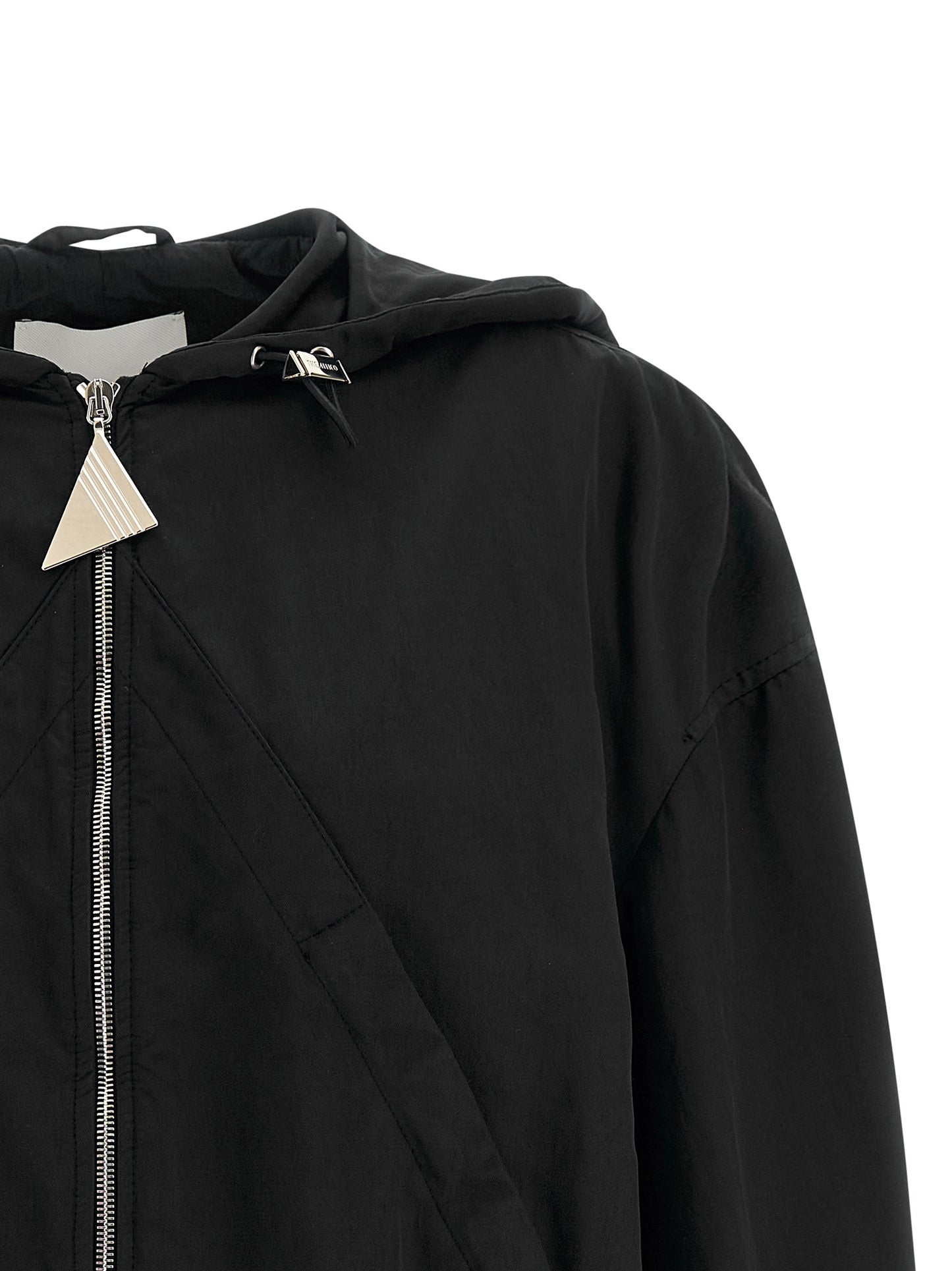 Hooded Bomber Jacket by The Attico for women in polyester & nylon black features a dramatic silhouette, showcasing a sophisticated hooded neckline and distinctive pockets & hooded for a dramatic aesthetic.