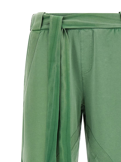 Casual Pants by The Attico for women in stretch cotton bicolour & green presents a refined pantology silhouette, artfully defined by a refined pantology , long, and a sophisticated .