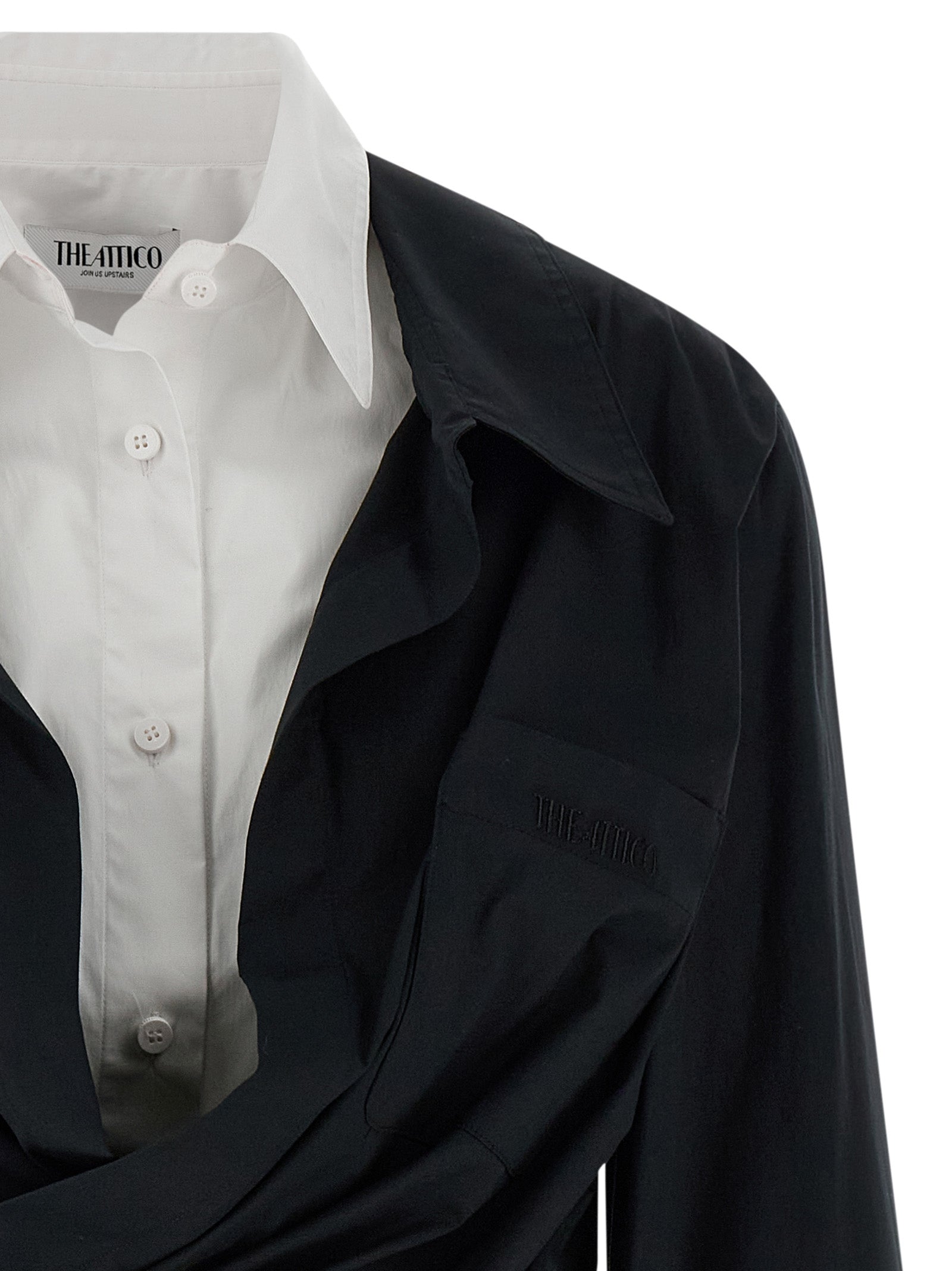 Dress by The Attico for women in stretch cotton bicolour, black & white showcases a striking silhouette, elegantly detailed with a , refined , and a striking short mini for a striking finish.