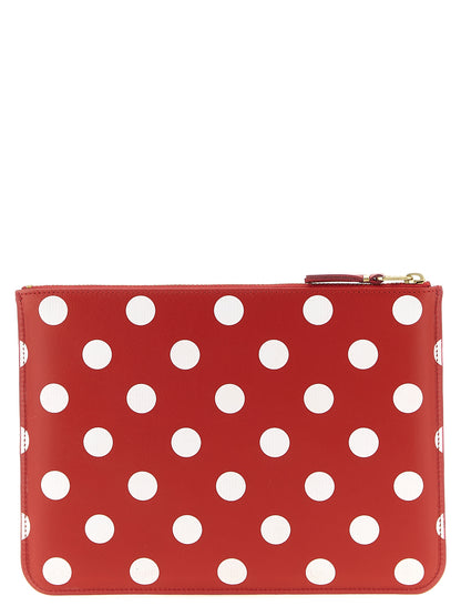 Wallet by Comme Des Garçons for men in calfskin leather multicolor, red & print presents a refined silhouette, artfully capturing the essence of the Calfskin Leather Wallet design with sophisticated for a refined look.
