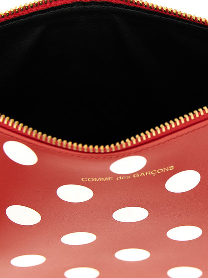 Wallet by Comme Des Garçons for men in calfskin leather multicolor, red & print presents a streamlined silhouette, showcasing the sophisticated design of the Calfskin Leather Wallet collection with functional .