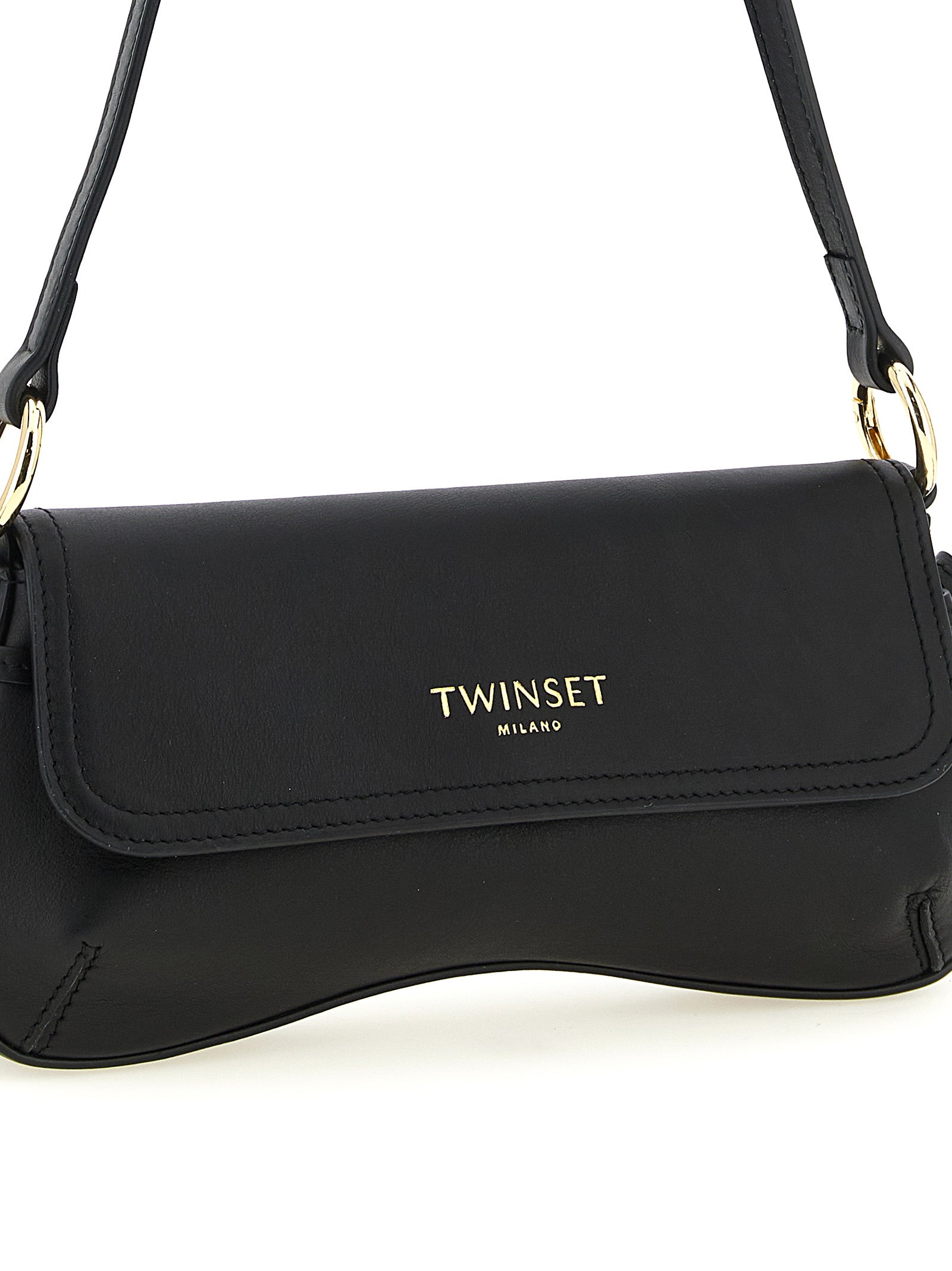 Shoulder Flap Bag by Twinset for women in calf leather black features a distinguished silhouette, showcasing a secure flap & magnetic and distinguished with versatile shoulder-strap & handle for a distinguished finish.