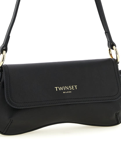 Shoulder Flap Bag by Twinset for women in calf leather black features a distinguished silhouette, showcasing a secure flap & magnetic and distinguished with versatile shoulder-strap & handle for a distinguished finish.