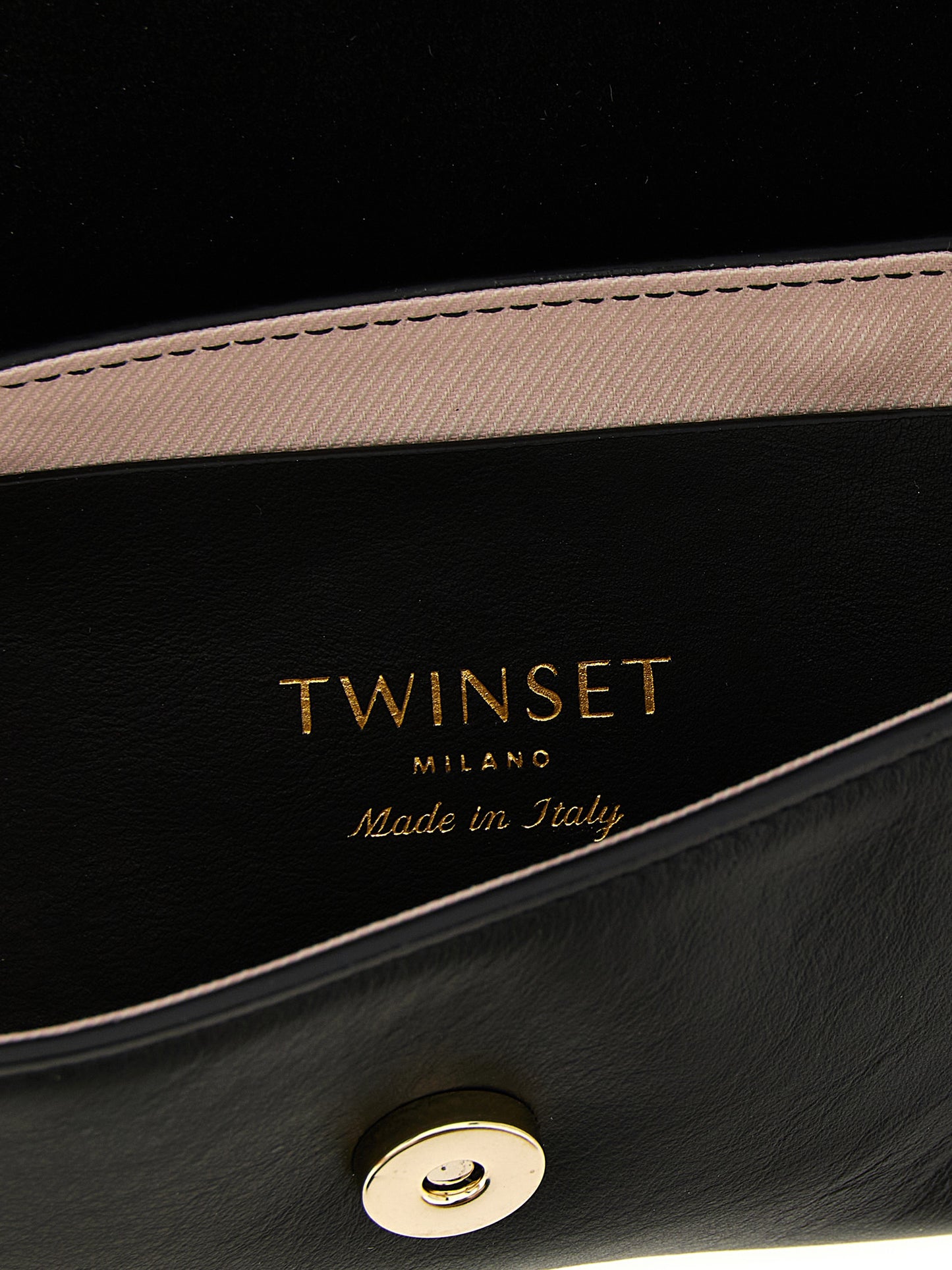 Shoulder Flap Bag by Twinset for women in calf leather black features a effortless sophistication silhouette, secured by a flap & magnetic with ample and versatile shoulder-strap & handle for a effortless sophistication finish.