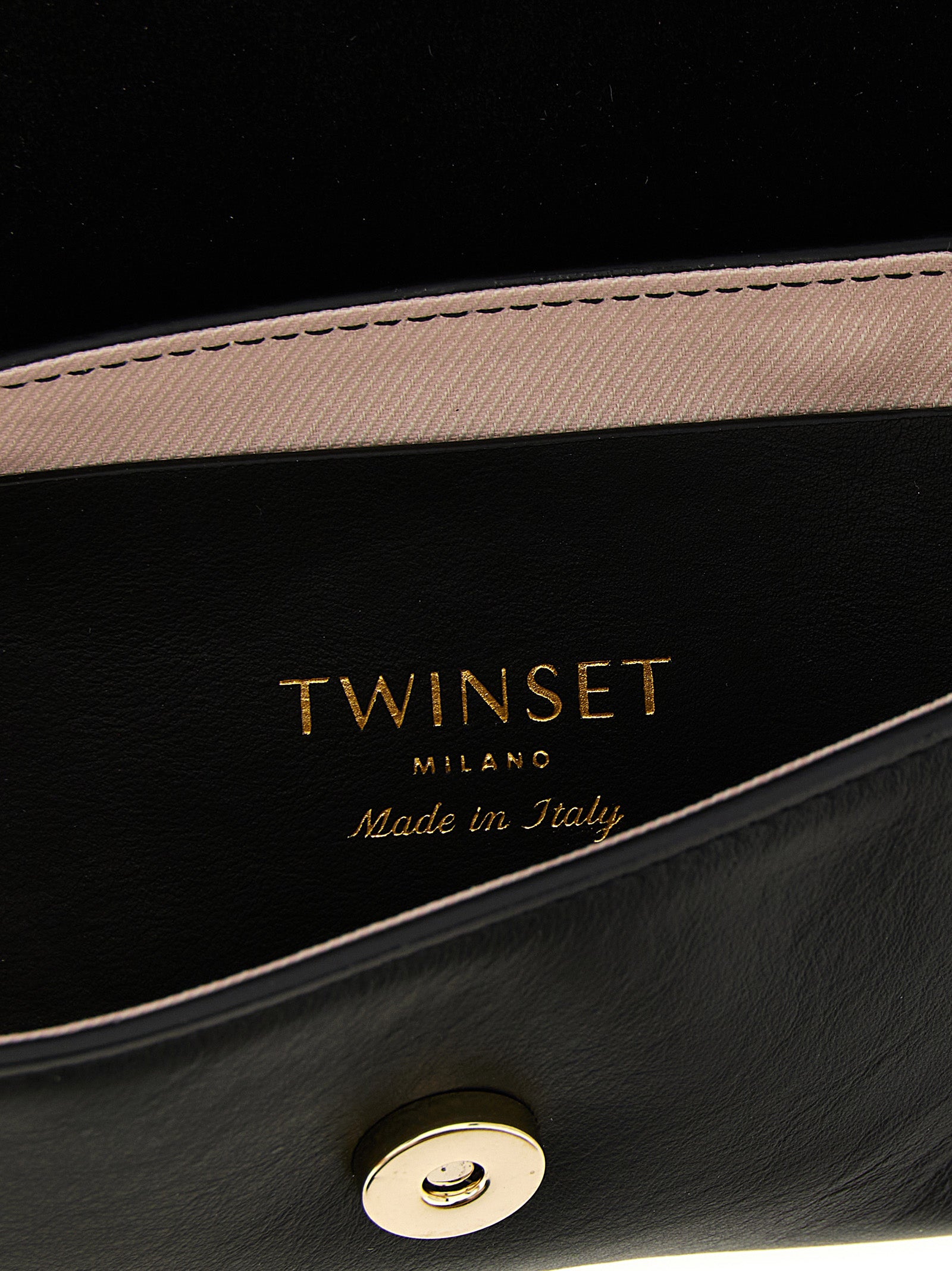 Shoulder Flap Bag by Twinset for women in calf leather black features a effortless sophistication silhouette, secured by a flap & magnetic with ample and versatile shoulder-strap & handle for a effortless sophistication finish.