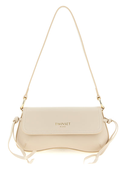 Shoulder Flap Bag by Twinset for women in calf leather white features a effortless sophistication silhouette, secured by a flap & magnetic with ample and versatile shoulder-strap & handle for a effortless sophistication finish.