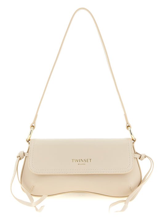Shoulder Flap Bag by Twinset for women in calf leather white features a effortless sophistication silhouette, secured by a flap & magnetic with ample and versatile shoulder-strap & handle for a effortless sophistication finish.