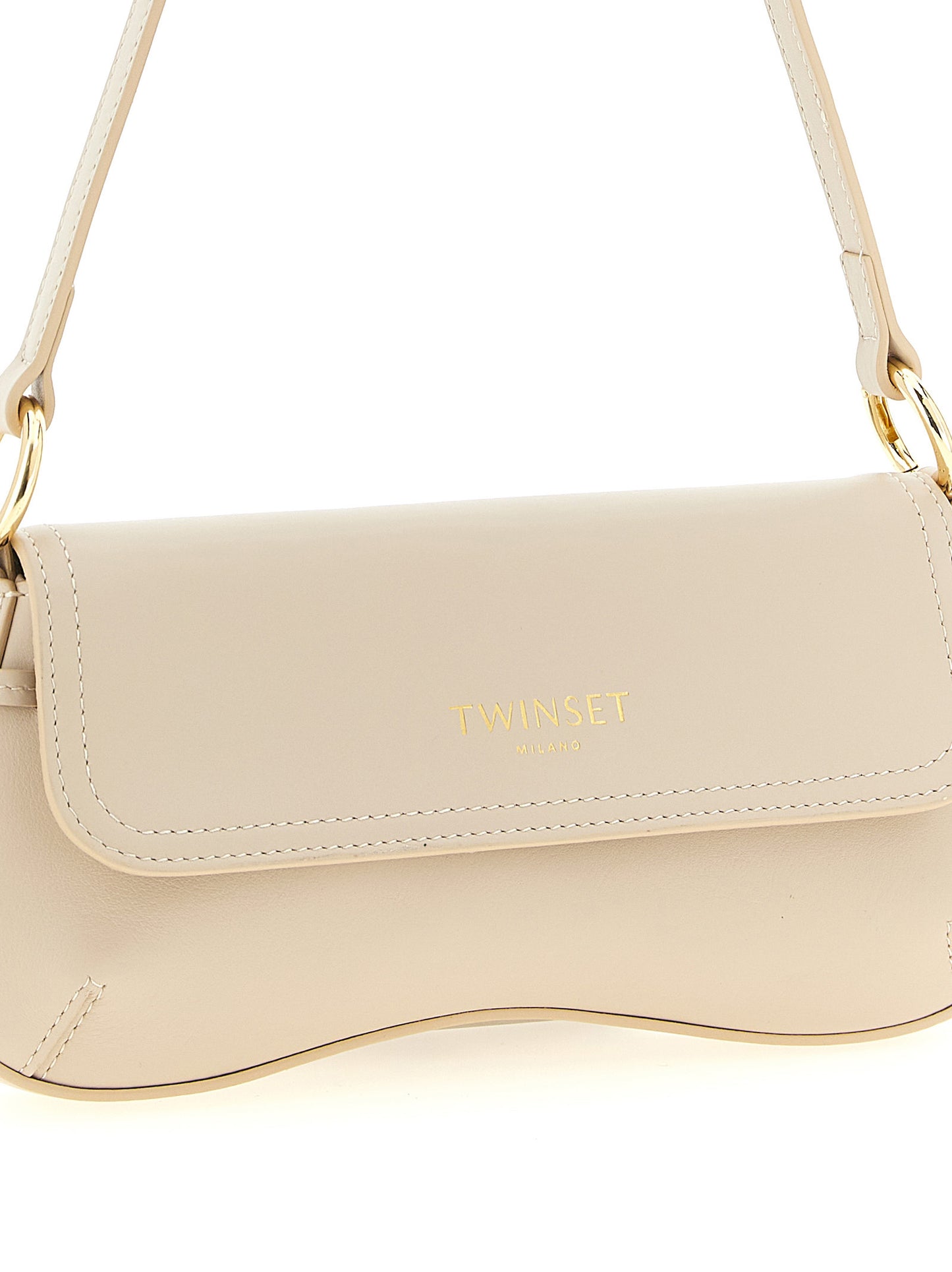 Shoulder Flap Bag by Twinset for women in calf leather white showcases a enviable silhouette, artfully detailed with a secure flap & magnetic, organized , and versatile shoulder-strap & handle for a enviable look.