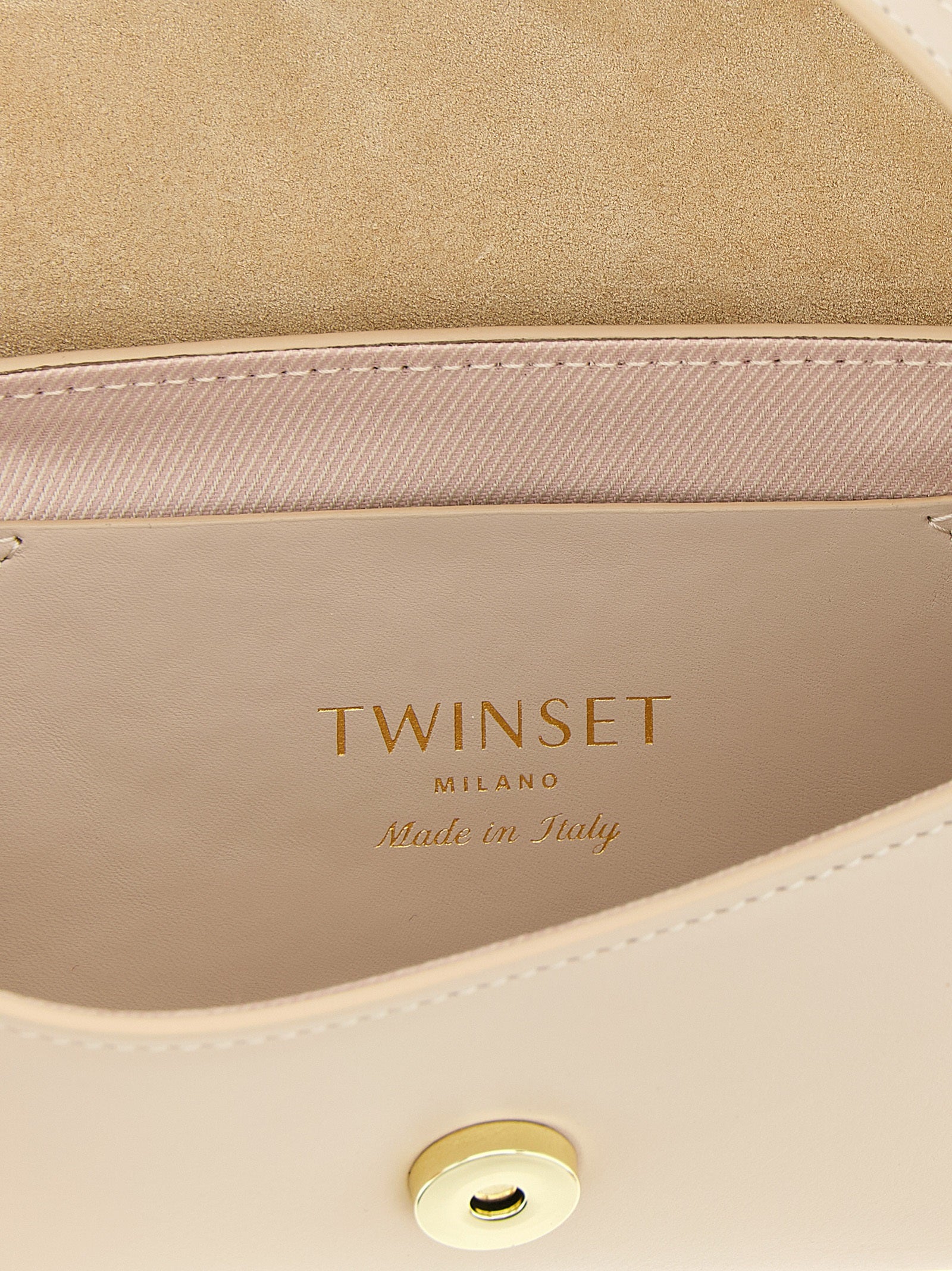 Shoulder Flap Bag by Twinset for women in calf leather white features an effortlessly chic silhouette with a secure flap & magnetic, ample , and versatile shoulder-strap & handle for effortlessly chic everyday luxury.
