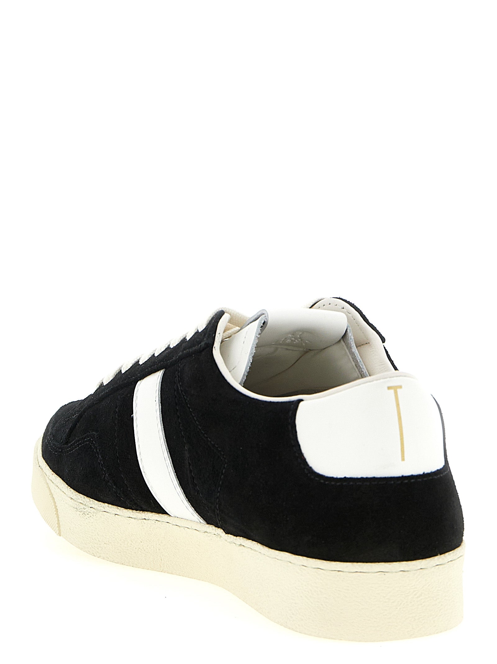 Sneakers by Tom Ford for men in suede leather & rubber bicolour, black & white presents a impeccable silhouette as Blake Men's Low Top Suede Leather & Rubber Sneakers, expertly defined by a impeccable low-top style for a impeccable, high-fashion look.