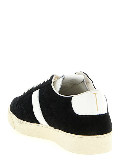 Sneakers by Tom Ford for men in suede leather & rubber bicolour, black & white presents a impeccable silhouette as Blake Men's Low Top Suede Leather & Rubber Sneakers, expertly defined by a impeccable low-top style for a impeccable, high-fashion look.