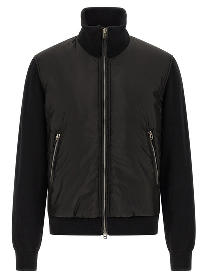 Bomber Jacket by Tom Ford for men in nylon polyamide leather & merino wool black presents a effortlessly chic silhouette, showcasing a sophisticated high-neck neckline and premium pockets & insulated for a truly effortlessly chic finish.