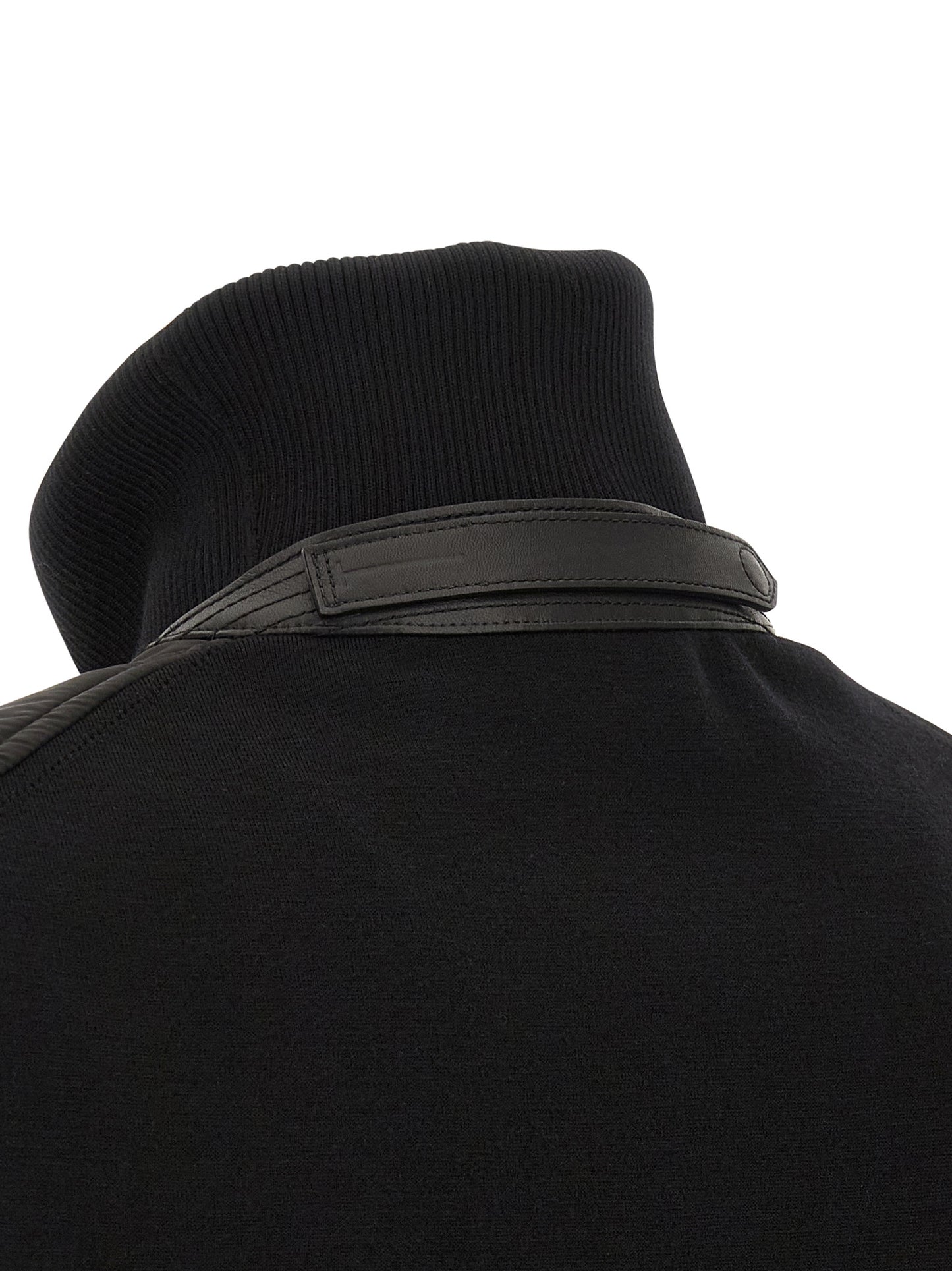 Bomber Jacket by Tom Ford for men in nylon polyamide leather & merino wool black features a dramatic silhouette, showcasing a sophisticated and distinctive pockets & insulated for a dramatic aesthetic.