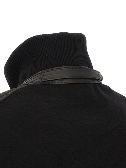 Bomber Jacket by Tom Ford for men in nylon polyamide leather & merino wool black features a dramatic silhouette, showcasing a sophisticated and distinctive pockets & insulated for a dramatic aesthetic.