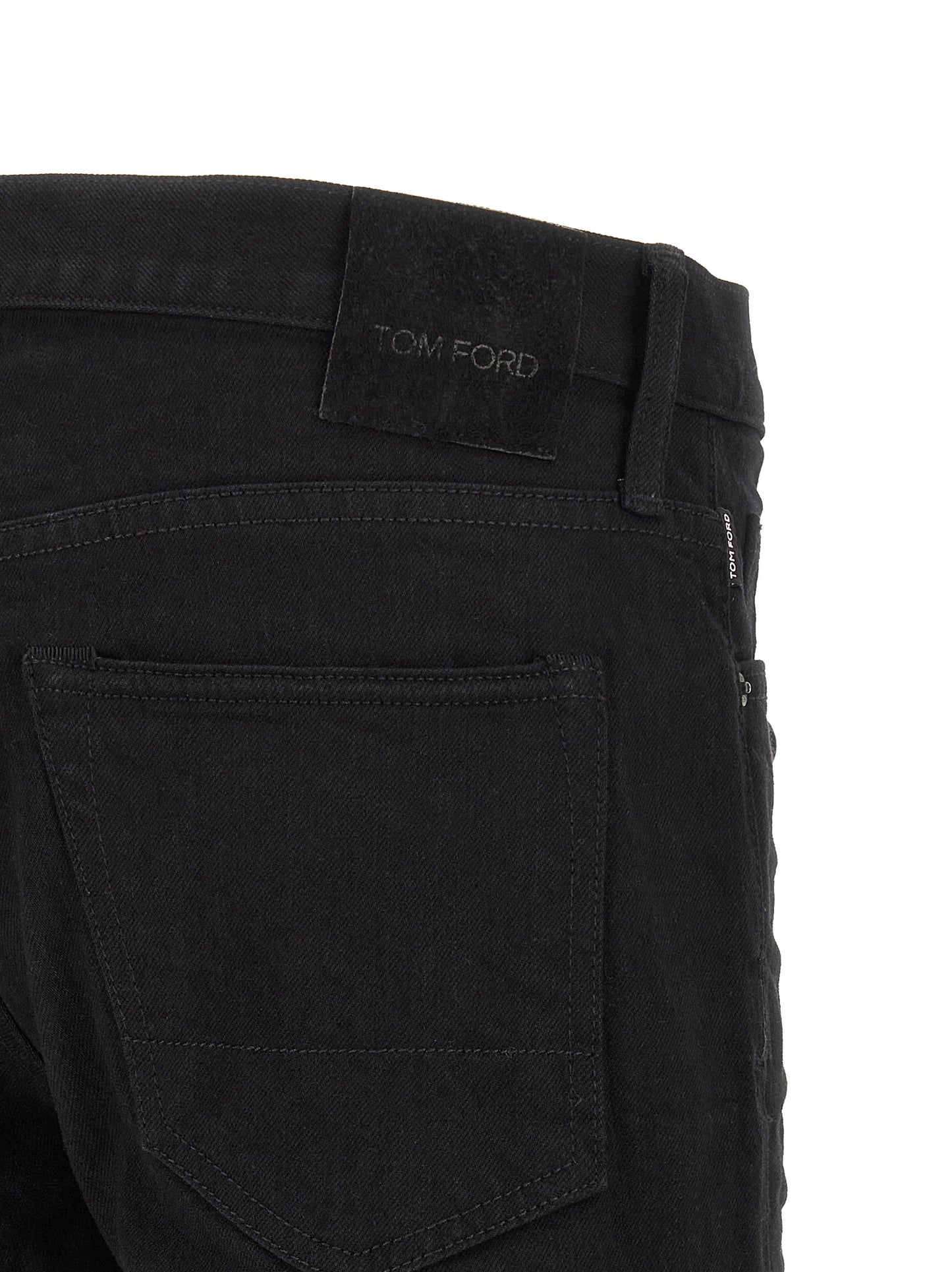 Jeans by Tom Ford for men in suede leather polyurethane & denim cotton black presents a tailored silhouette, showcasing a tailored straight-leg and long cut with a refined for a truly tailored aesthetic.