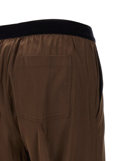 Casual Pants by Tom Ford for women in satin silk velvet brown features a refined silhouette with a refined straight-leg, defined by a and a refined long for a refined finish.